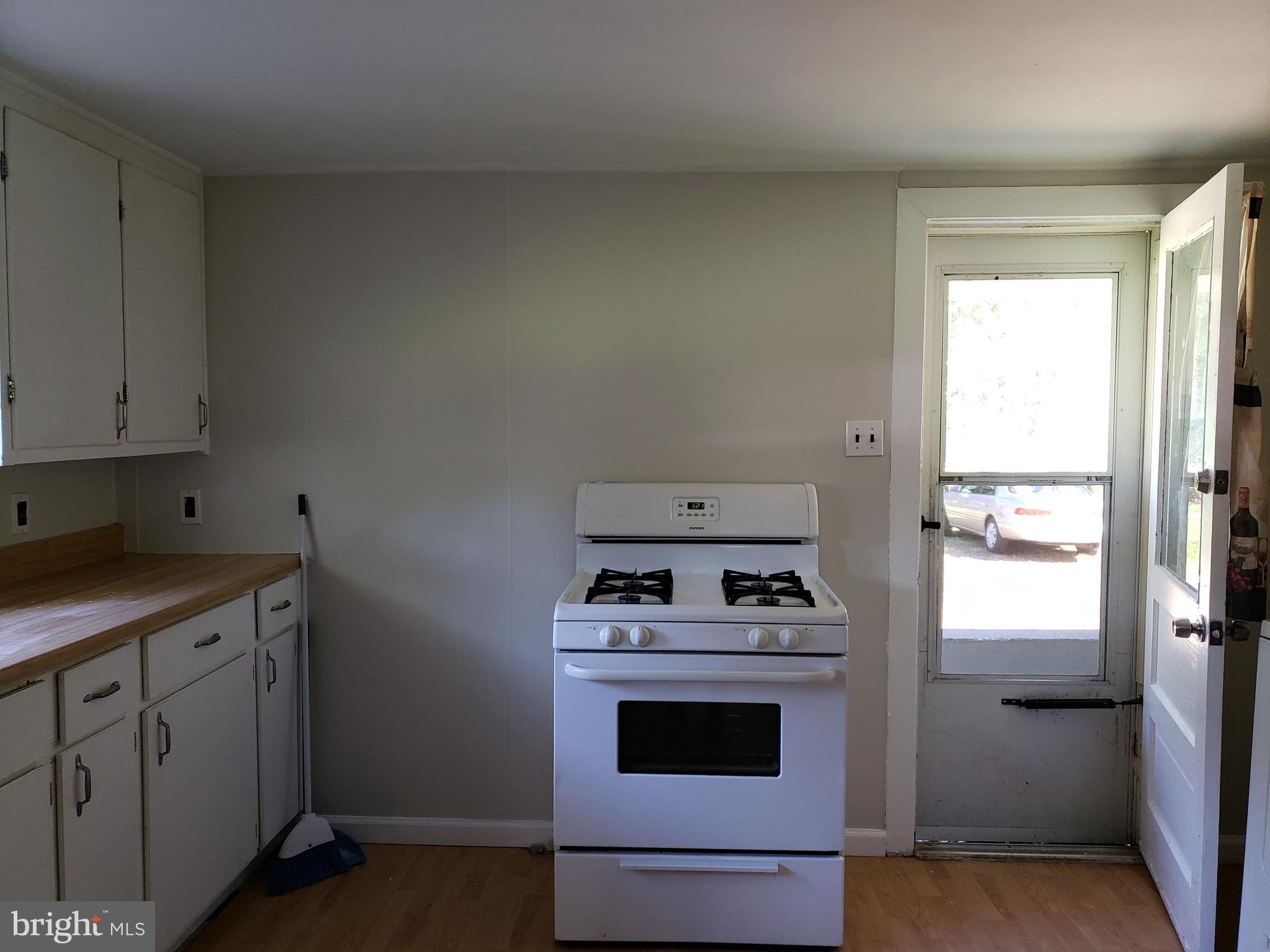 625 North Forklanding Road Maple Shade, NJ 08052 - Photo 9 of 16 a kitchen with appliances cabinets and a window
