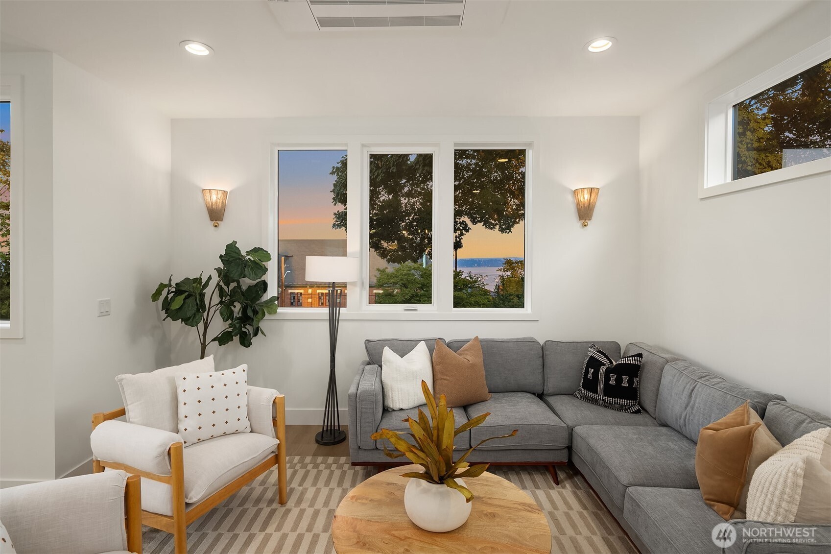 920 34th Avenue, Unit B Seattle, WA 98122 - Photo 18 of 38 a living room with furniture and a large window