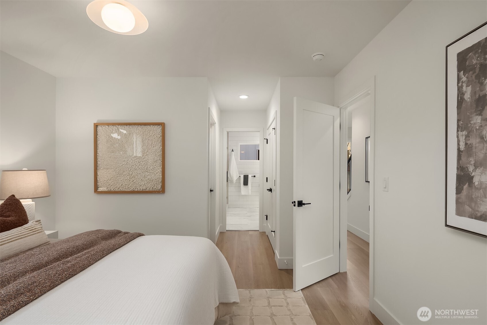 920 34th Avenue, Unit B Seattle, WA 98122 - Photo 22 of 38 a bedroom with a bed and a couch