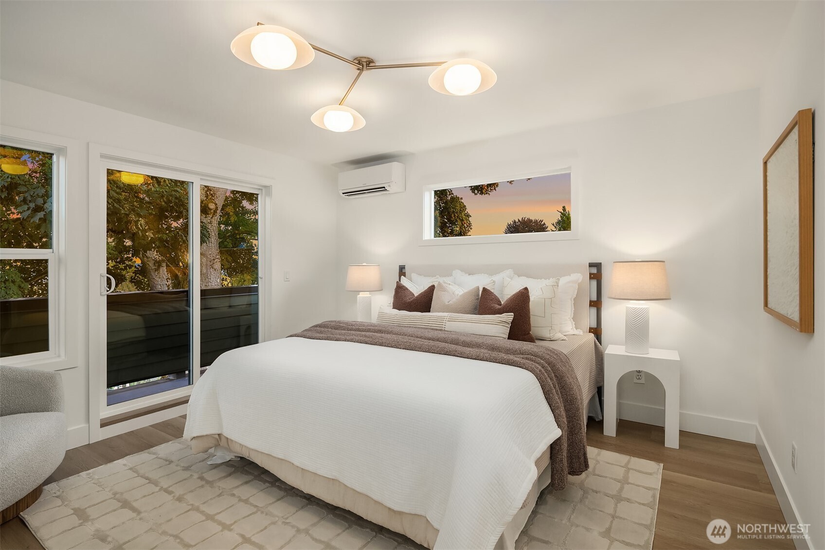 920 34th Avenue, Unit B Seattle, WA 98122 - Photo 24 of 38 a bedroom with a bed and a large window