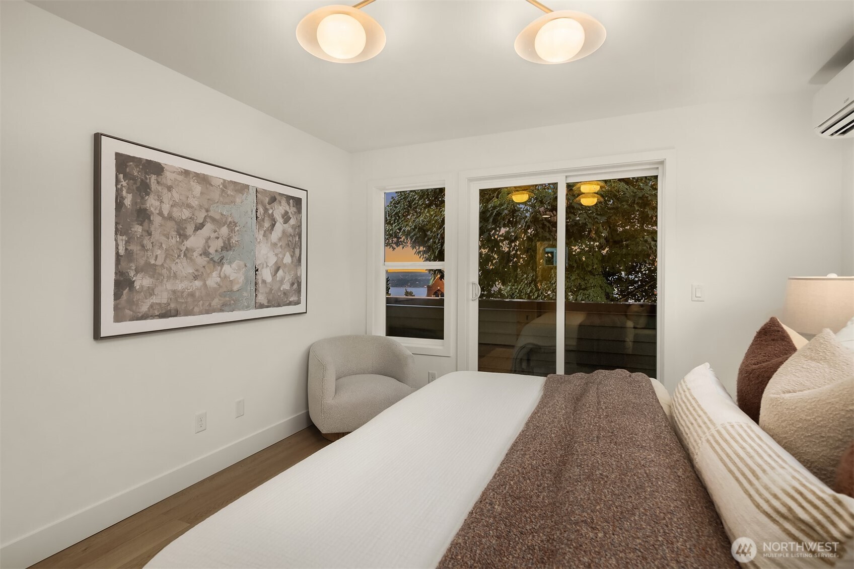 920 34th Avenue, Unit B Seattle, WA 98122 - Photo 25 of 38 a bedroom with furniture and a large window