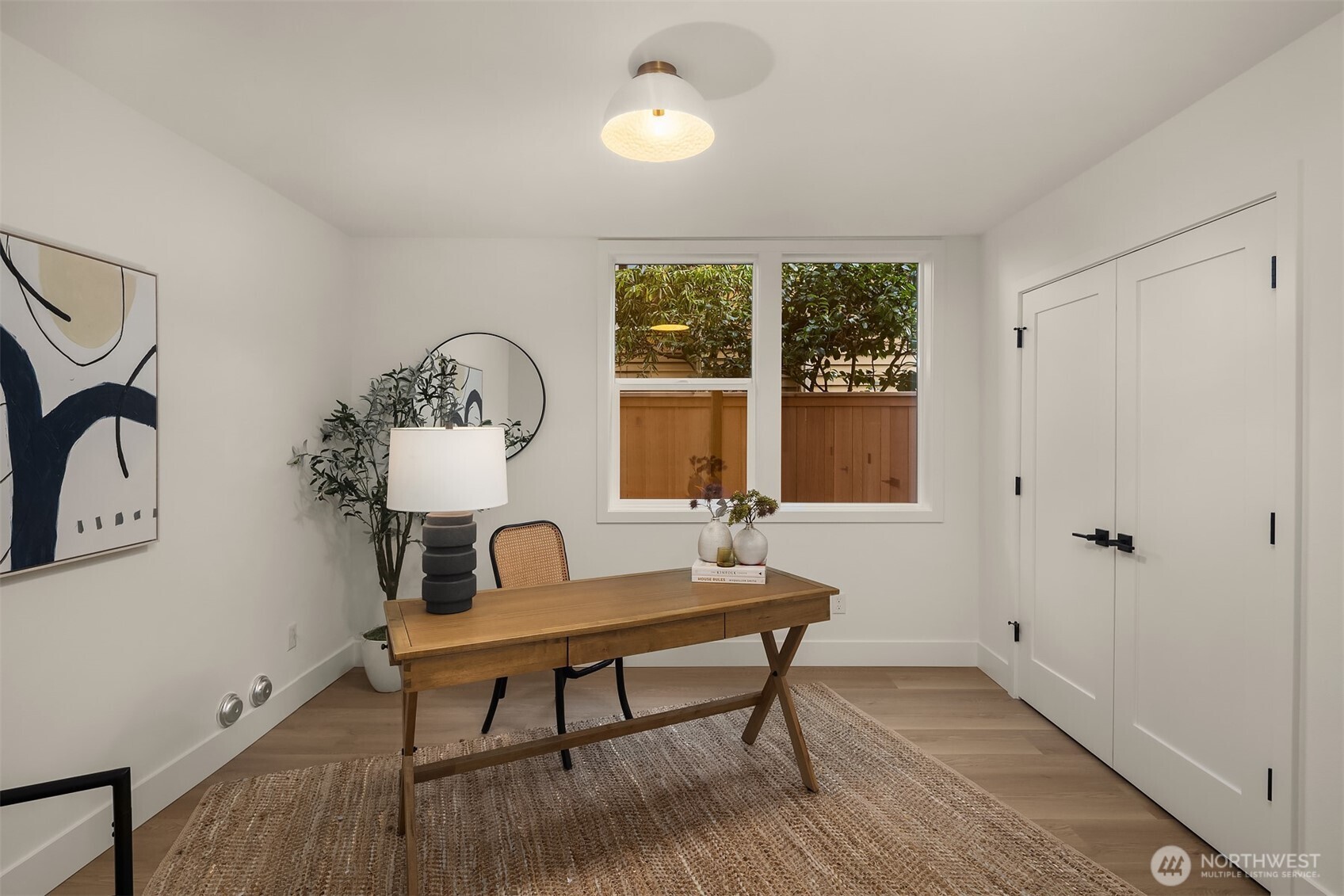 920 34th Avenue, Unit B Seattle, WA 98122 - Photo 26 of 38 a living room with furniture and a window