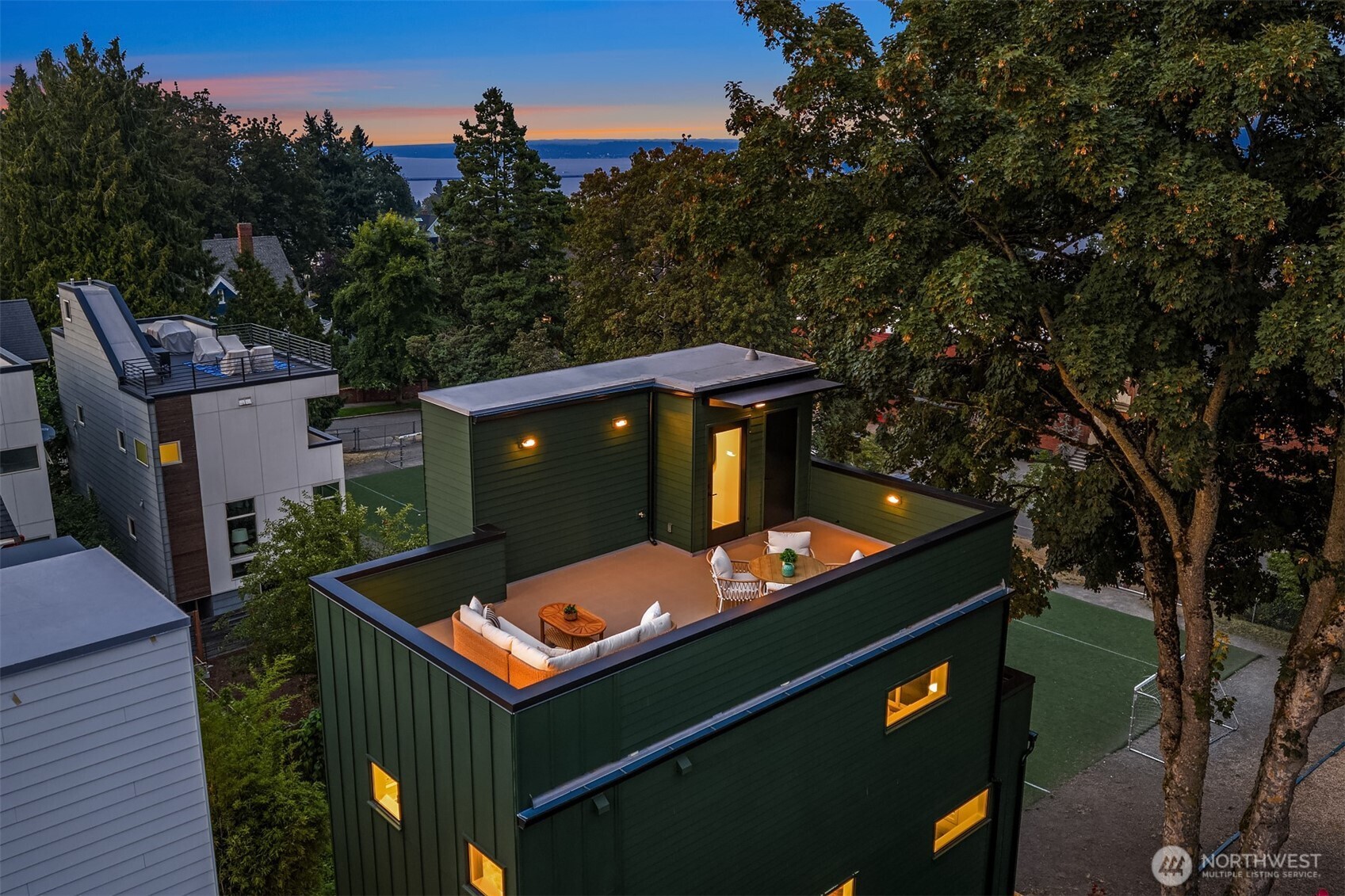 920 34th Avenue, Unit B Seattle, WA 98122 - Photo 3 of 38 an aerial view of a house with swimming pool and outdoor space