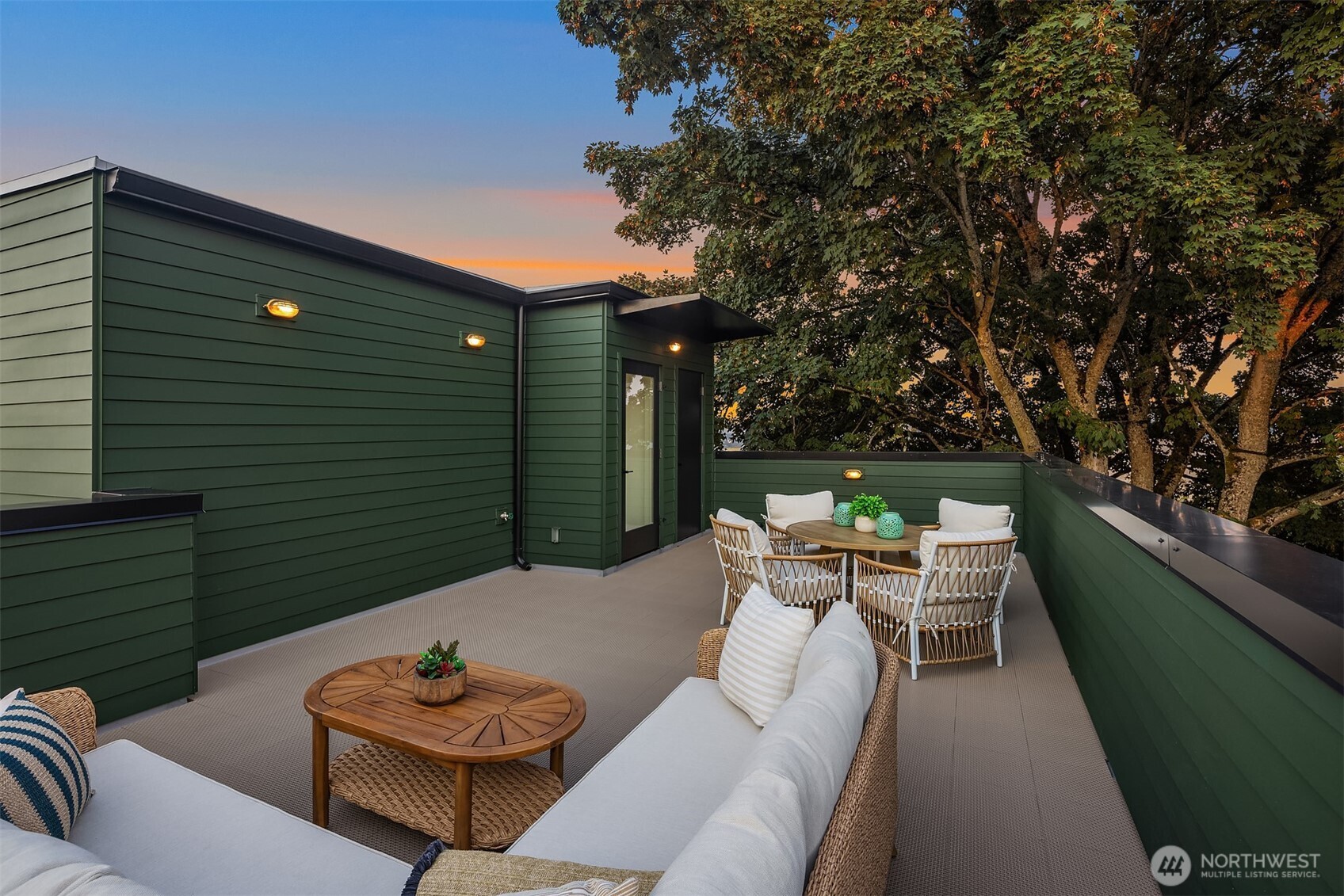 920 34th Avenue, Unit B Seattle, WA 98122 - Photo 36 of 38 a backyard of a house with outdoor seating