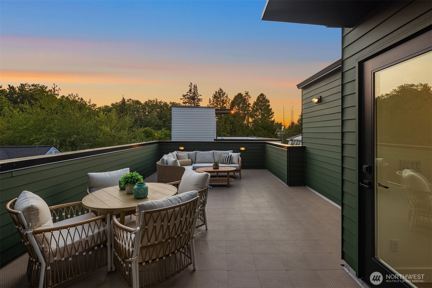 920 34th Avenue, Unit B Seattle, WA 98122 - Photo 37 of 38 a balcony with furniture and a potted plant