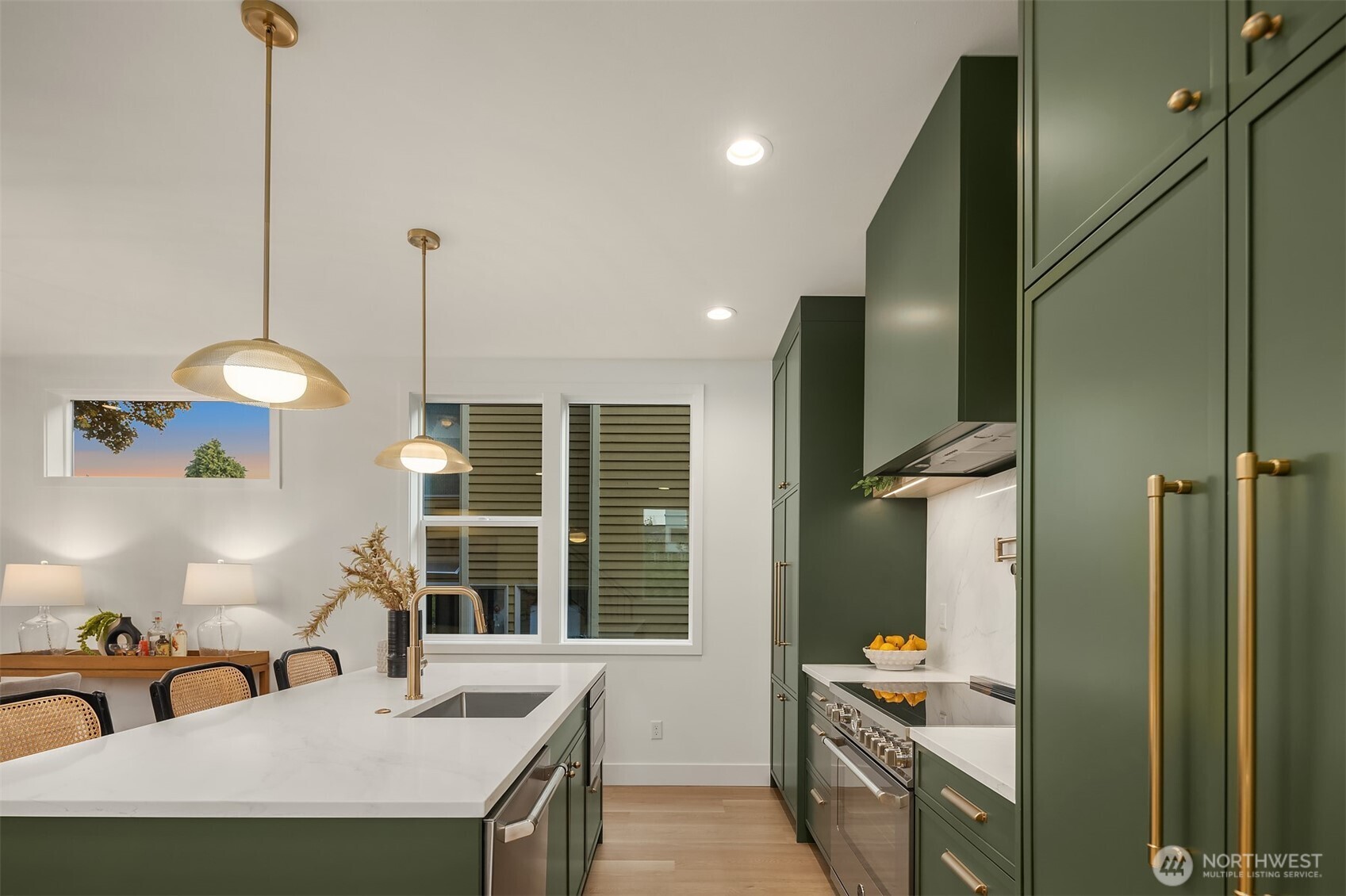 920 34th Avenue, Unit B Seattle, WA 98122 - Photo 8 of 38 a kitchen with sink refrigerator and window