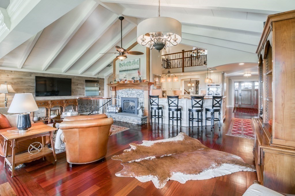 791 Ridge Road Wilbraham, MA 01095 - Photo 11 of 40 a view of a dining room with furniture a chandelier and wooden floor