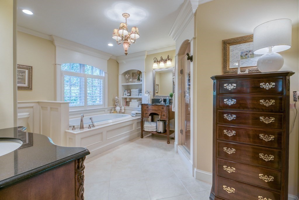 791 Ridge Road Wilbraham, MA 01095 - Photo 14 of 40 a spacious bathroom with a tub double sink and a large mirror