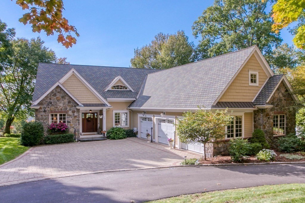 791 Ridge Road Wilbraham, MA 01095 - Photo 2 of 40 a aerial view of a house with a yard and potted plants