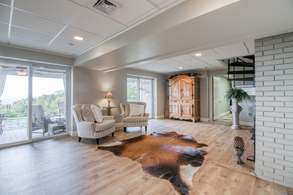 791 Ridge Road Wilbraham, MA 01095 - Photo 29 of 40 a living room with furniture and large windows