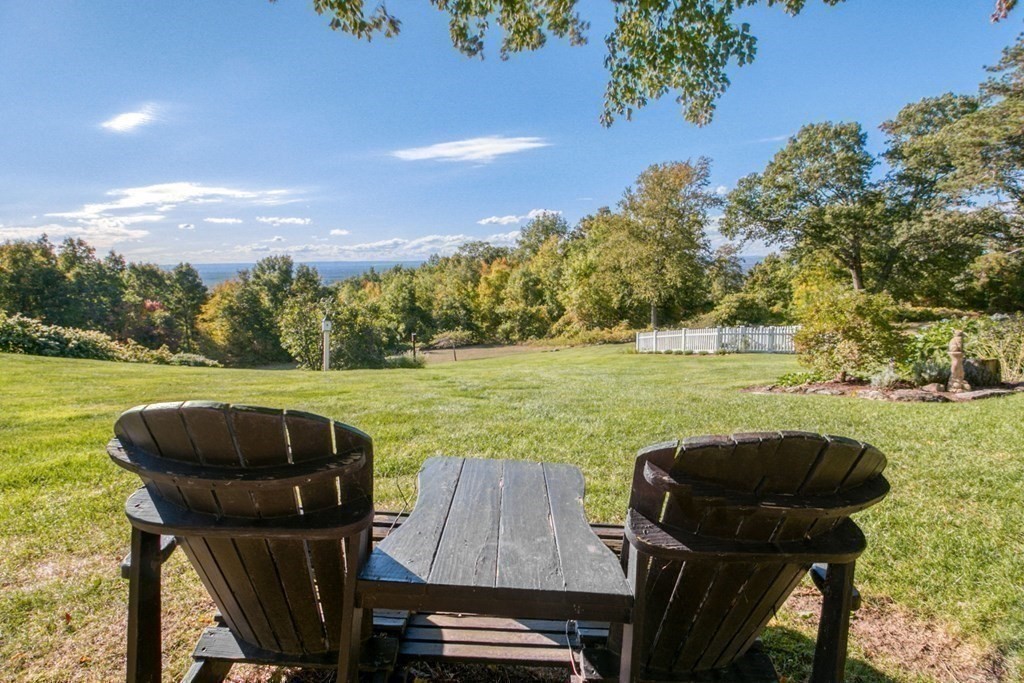 791 Ridge Road Wilbraham, MA 01095 - Photo 33 of 40 a view of a swimming pool and lounge chairs