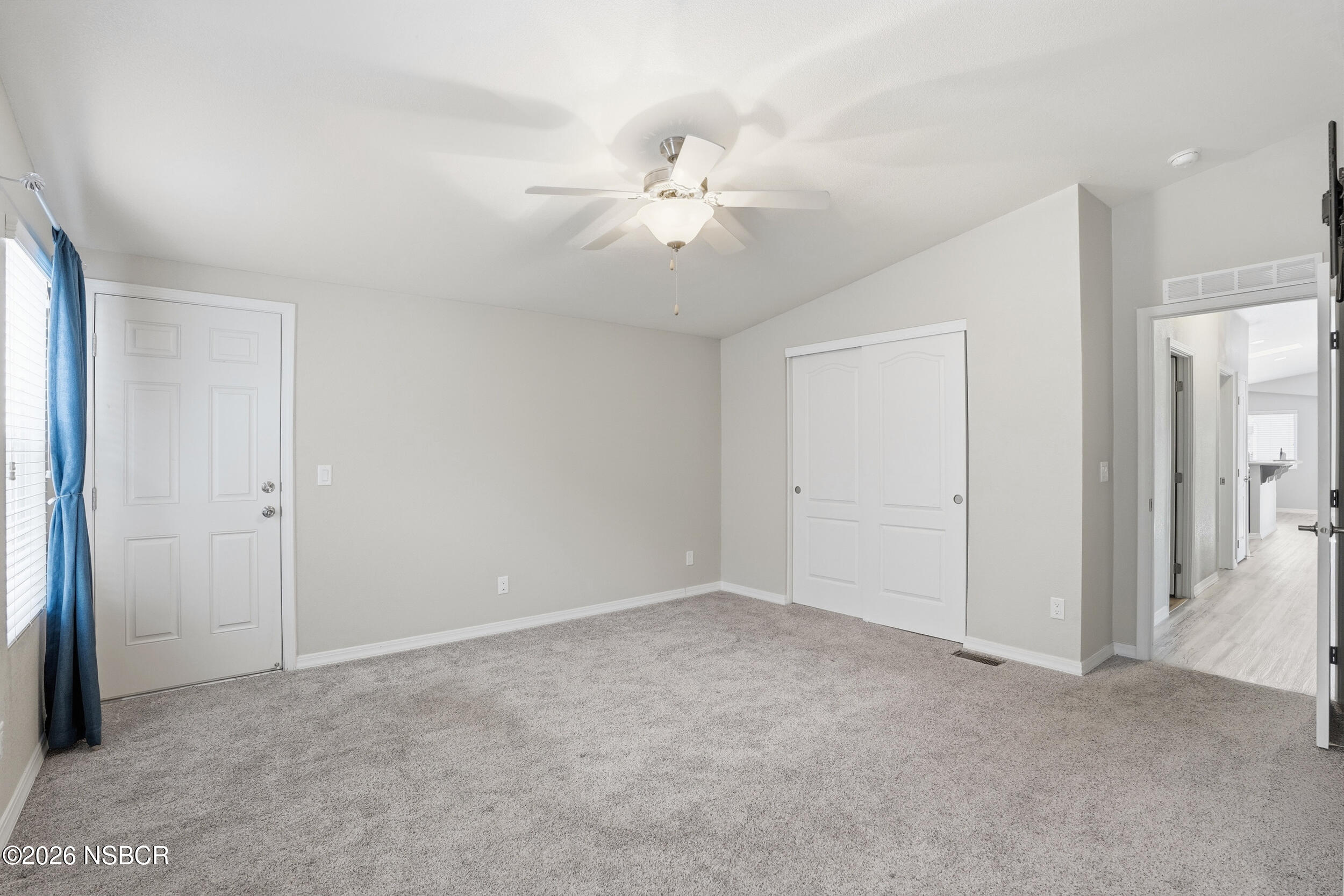 500 Atascadero Road, Unit M3 Morro Bay, CA 93442 - Photo 23 of 29 an empty room with closet and a chandelier fan