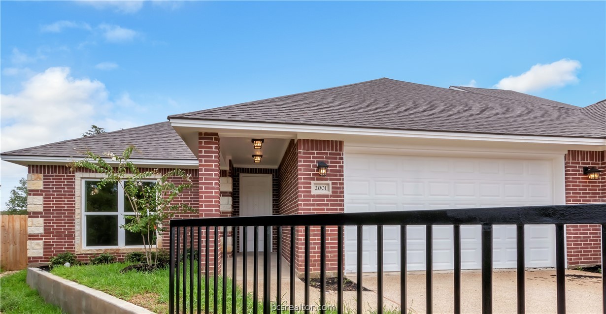 a front view of a house with mountain view