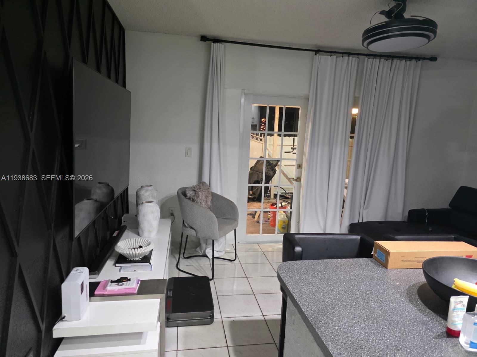 4837 Southwest 144th Court Miami, FL 33175 - Photo 5 of 10 a living room with furniture