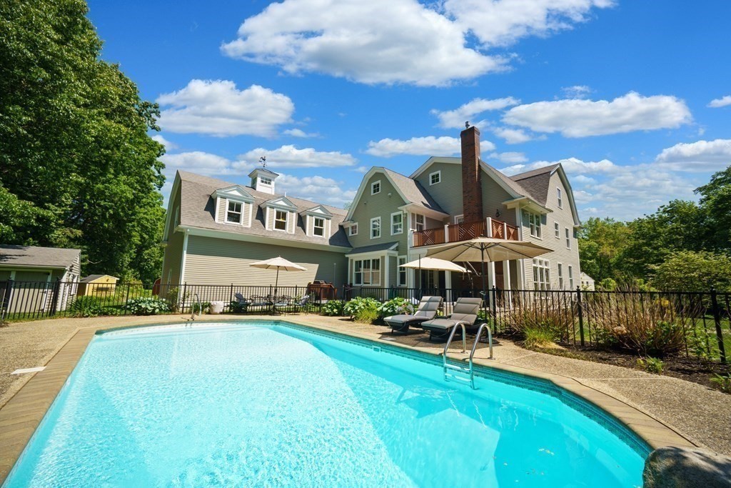 19 Marked Tree Road Sudbury, MA 01776 - Photo 2 of 42 a view of a building with a yard