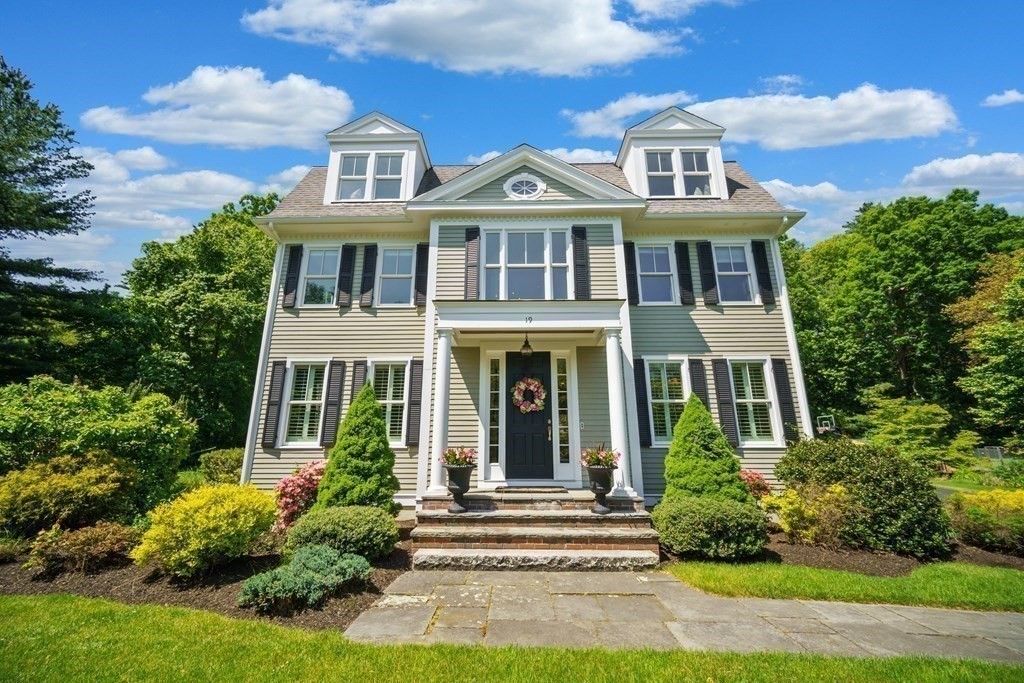 19 Marked Tree Road Sudbury, MA 01776 - Photo 3 of 42 front view of a house with a yard
