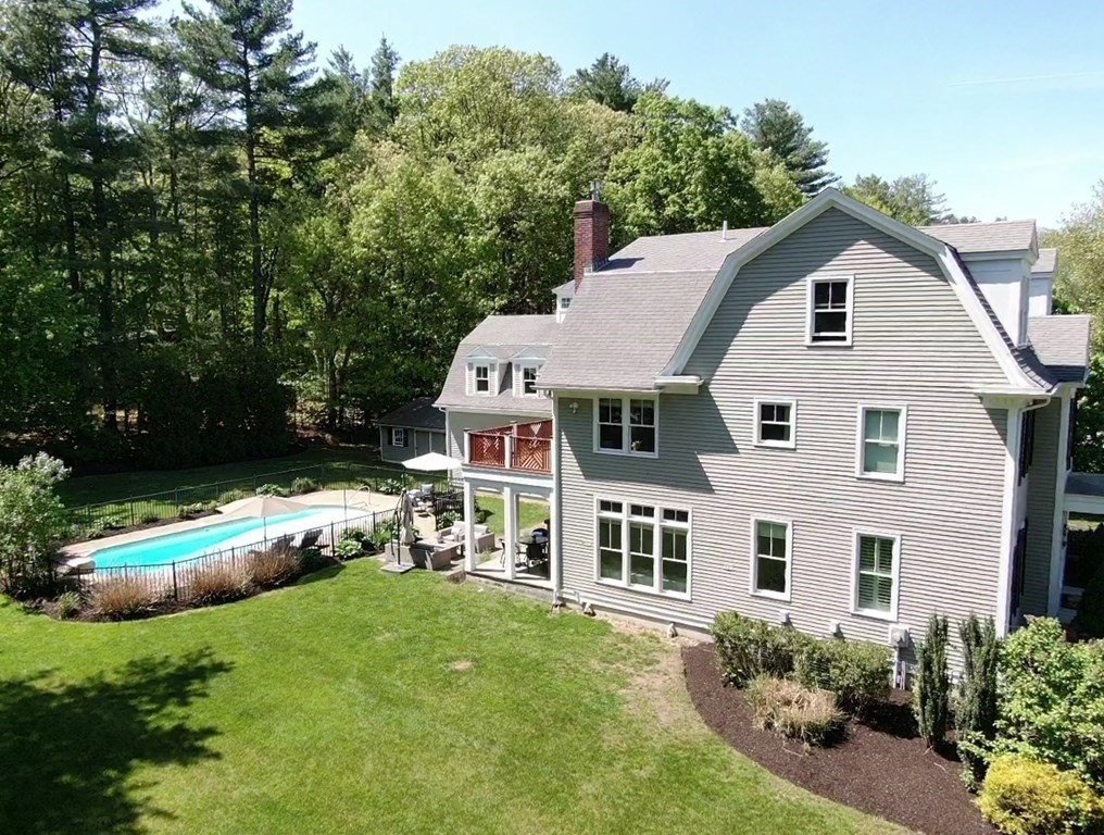 19 Marked Tree Road Sudbury, MA 01776 - Photo 35 of 42 a aerial view of a house with a yard