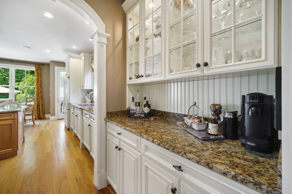 19 Marked Tree Road Sudbury, MA 01776 - Photo 8 of 42 a kitchen with sink and refrigerator
