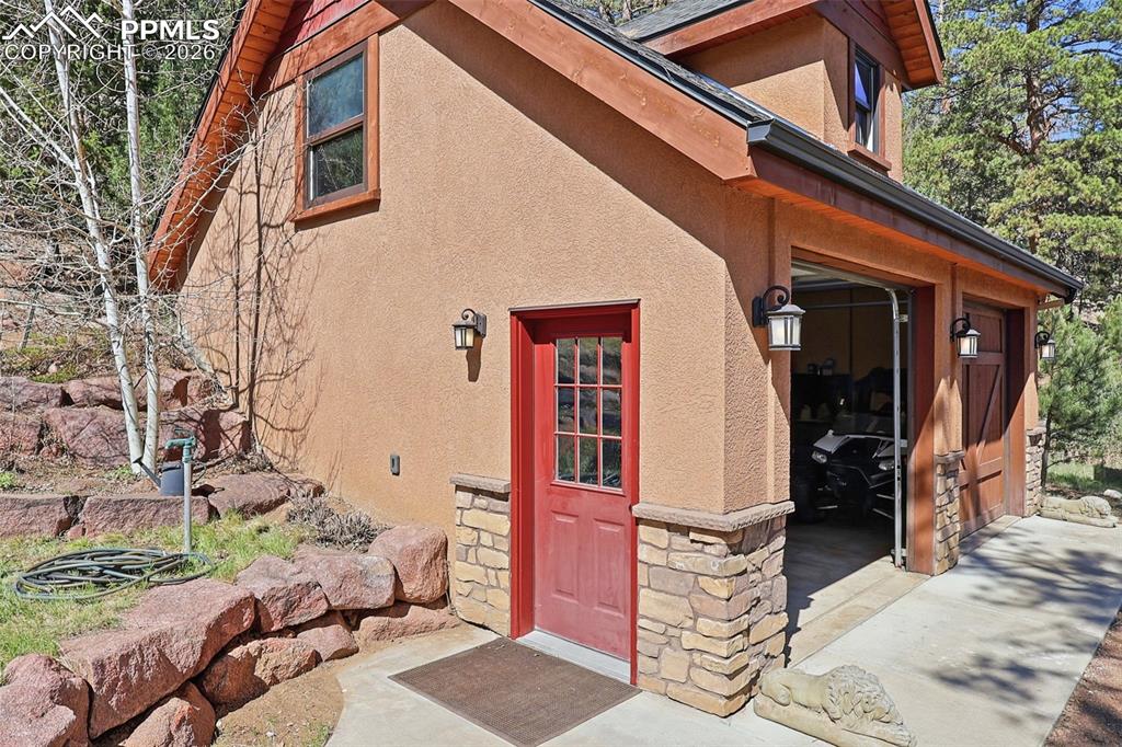 89 Ranch View Road Florissant, CO 80816 - Photo 40 of 50 The 2 1/2 car detached garage perfectly reflects the homes design and structual elgance.