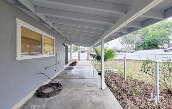 a backyard of a house with garden