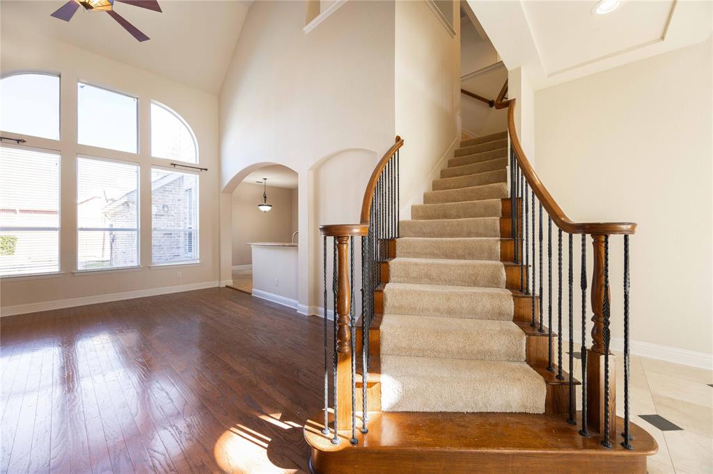 2009 Briarbrook Lane Allen, TX 75002 - Photo 15 of 40 a view of entryway and hall with wooden floor