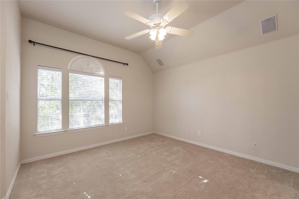 2009 Briarbrook Lane Allen, TX 75002 - Photo 26 of 40 an empty room with a window and a fan