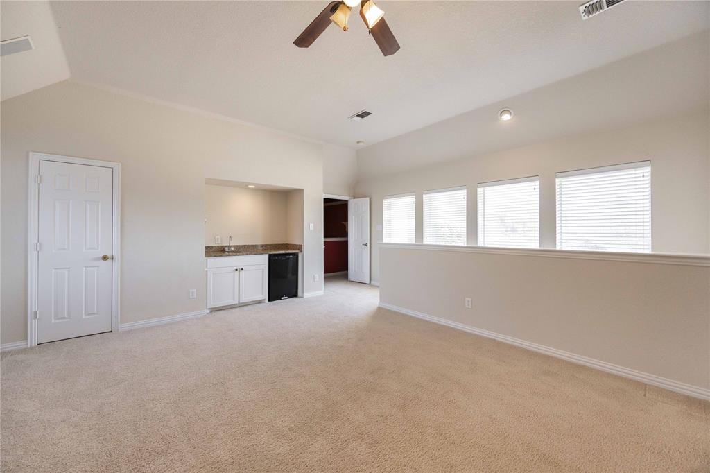 2009 Briarbrook Lane Allen, TX 75002 - Photo 31 of 40 a view of an empty room with window and cabinet