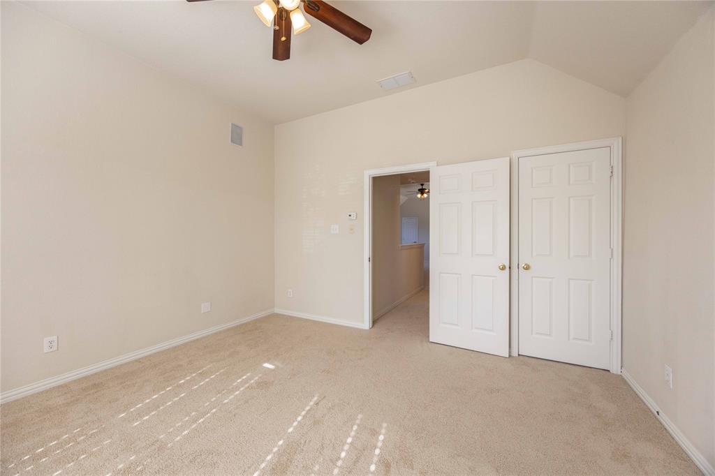2009 Briarbrook Lane Allen, TX 75002 - Photo 34 of 40 an empty room with ceiling fan and window
