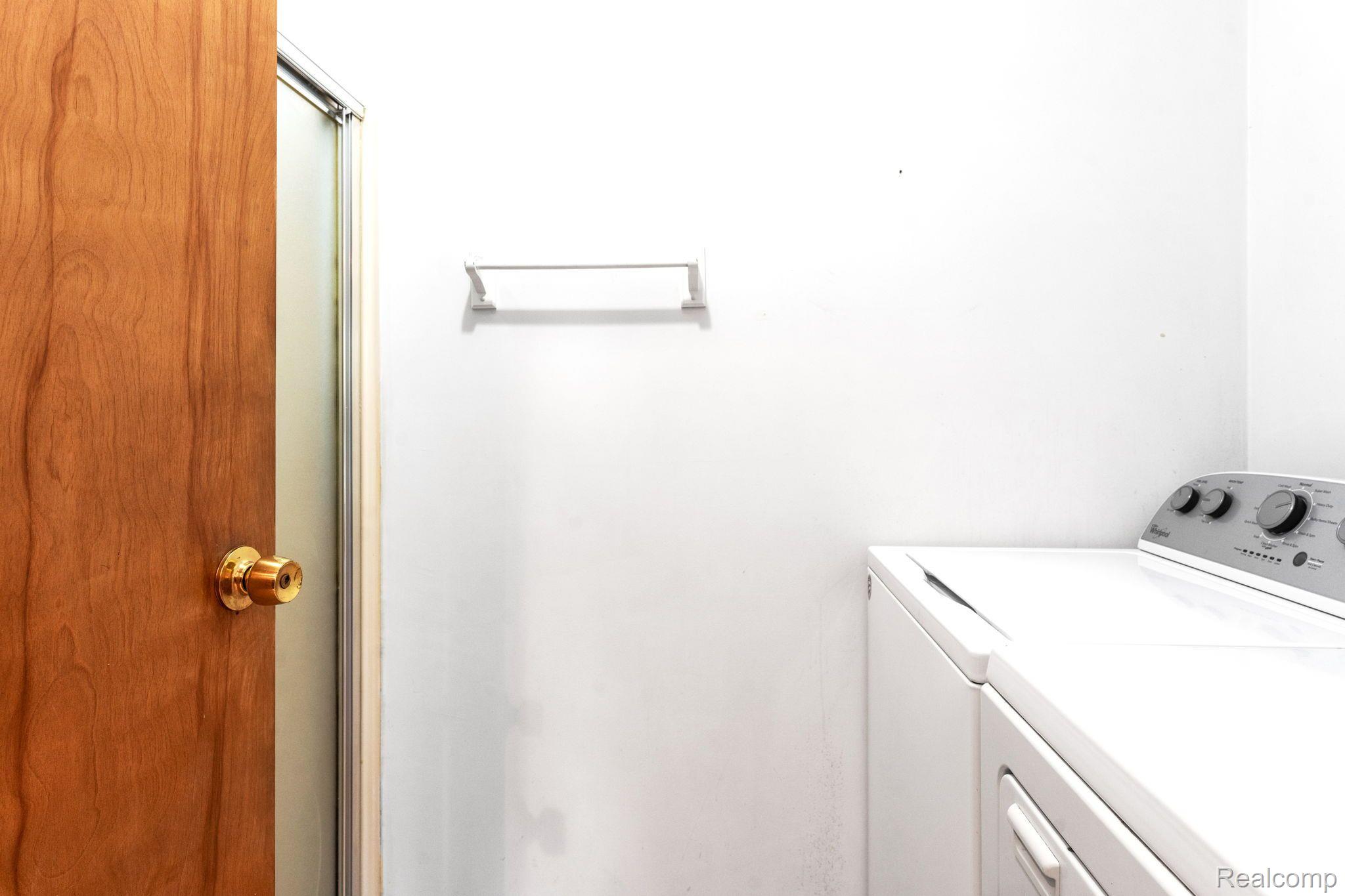 9212 West Albain Road Ida, MI 48140 - Photo 24 of 46 FIRST FLOOR LAUNDRY W/SHOWER