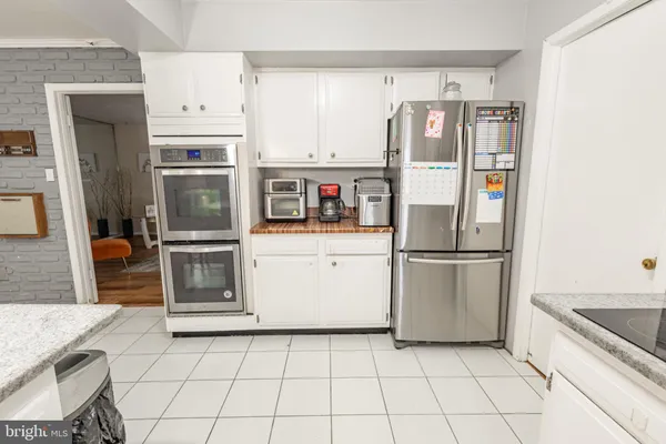 a view of a swimming pool with seating area