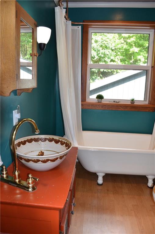 164 Householder Road New Brighton, PA 15066 - Photo 13 of 22 Full bath with a claw foot tub and funiture style bowl top vanity