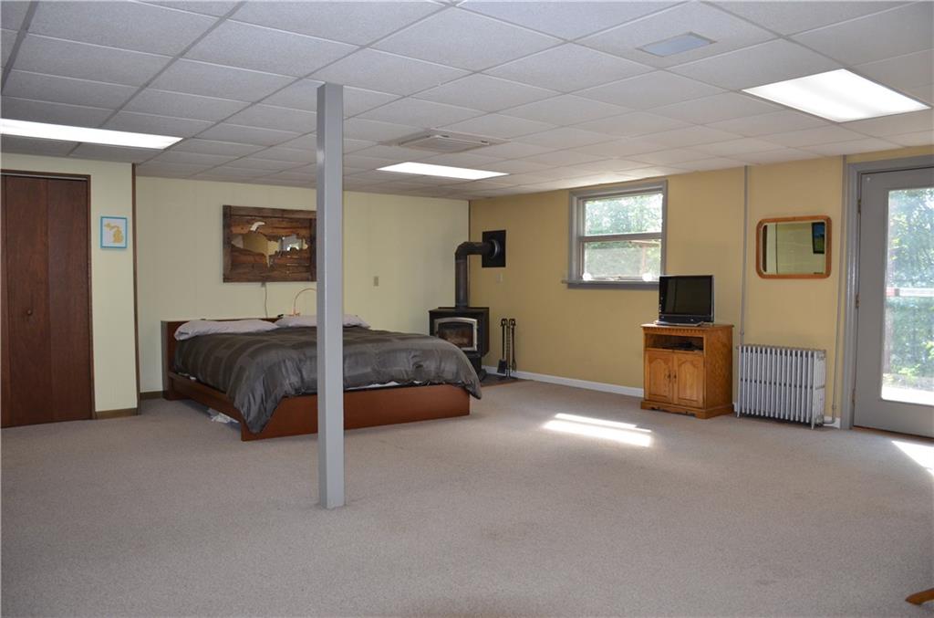 164 Householder Road New Brighton, PA 15066 - Photo 14 of 22 Huge lower level is a master suite boasting a wood burner, French doors to patio and a private bath