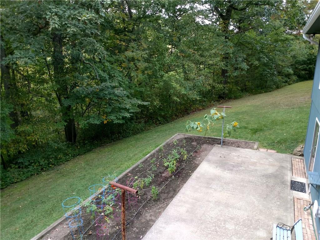 164 Householder Road New Brighton, PA 15066 - Photo 16 of 22 walk out from lower level to a patio and garden