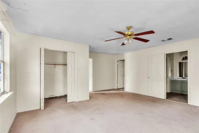 an empty room with windows