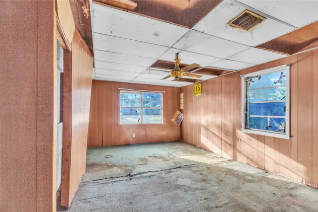 an empty room with windows