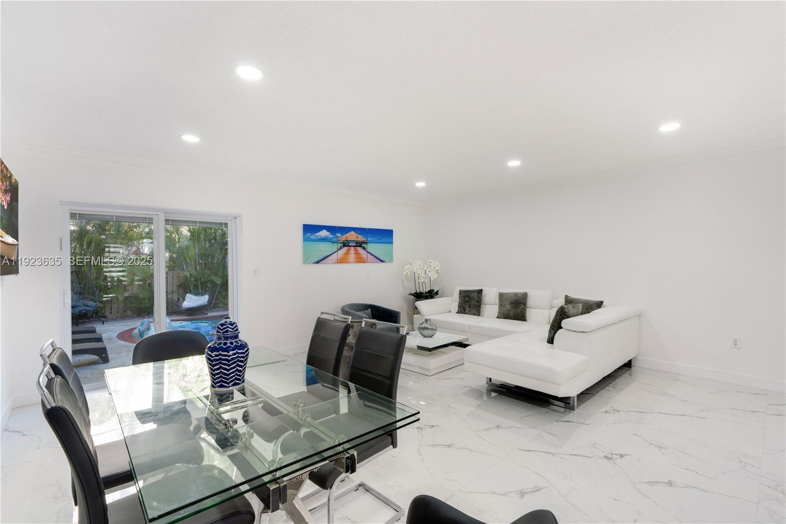 9167 Harding Avenue, Unit 9167 Surfside, FL 33154 - Photo 2 of 45 a living room with furniture and wooden floor