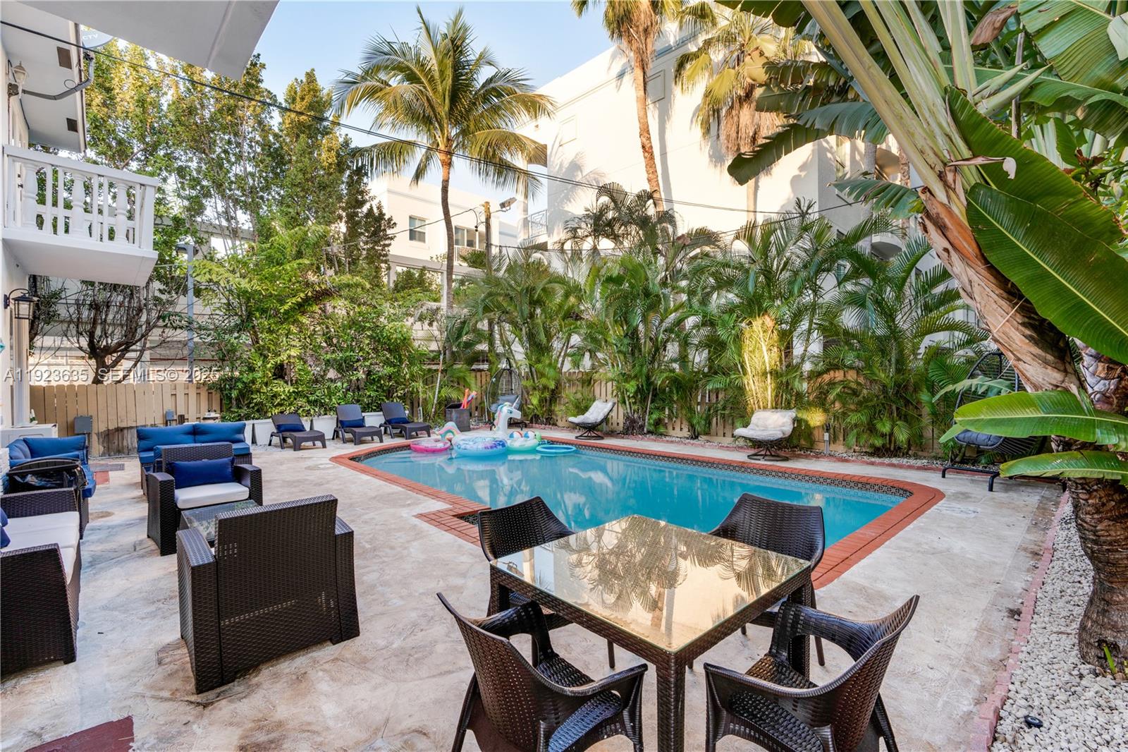 9167 Harding Avenue, Unit 9167 Surfside, FL 33154 - Photo 27 of 45 a outdoor space with a table and chairs