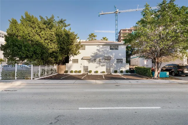 a view of a building with a street