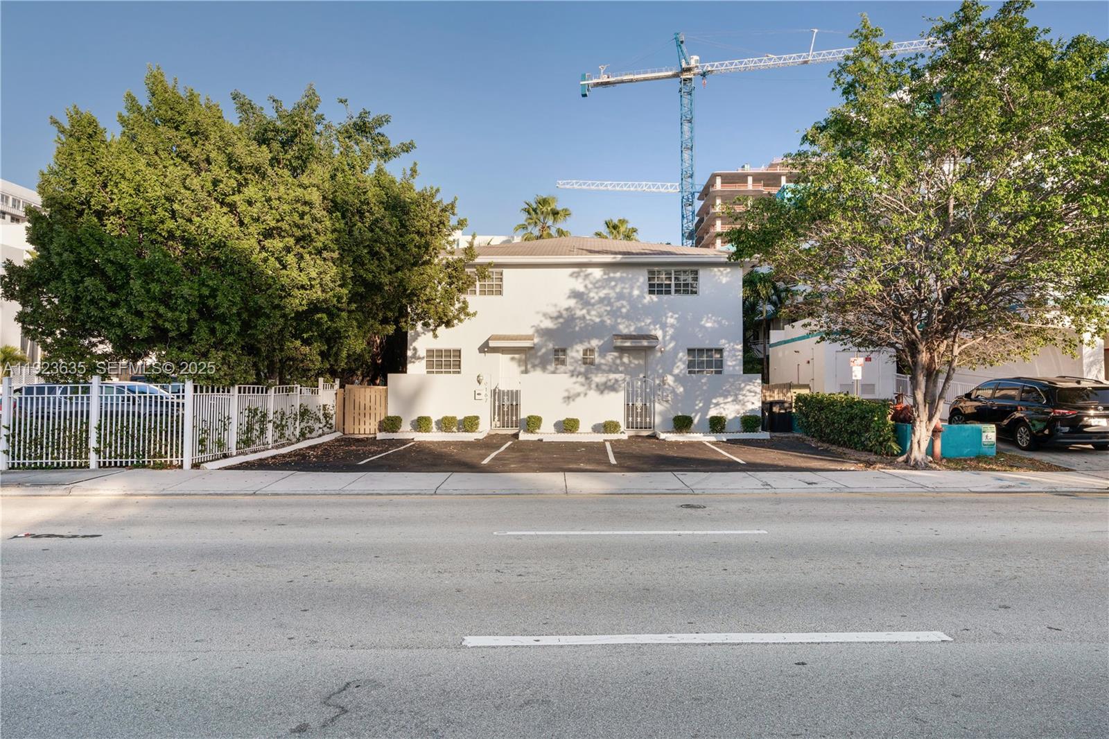 9167 Harding Avenue, Unit 9167 Surfside, FL 33154 - Photo 35 of 45 a view of a building with a street