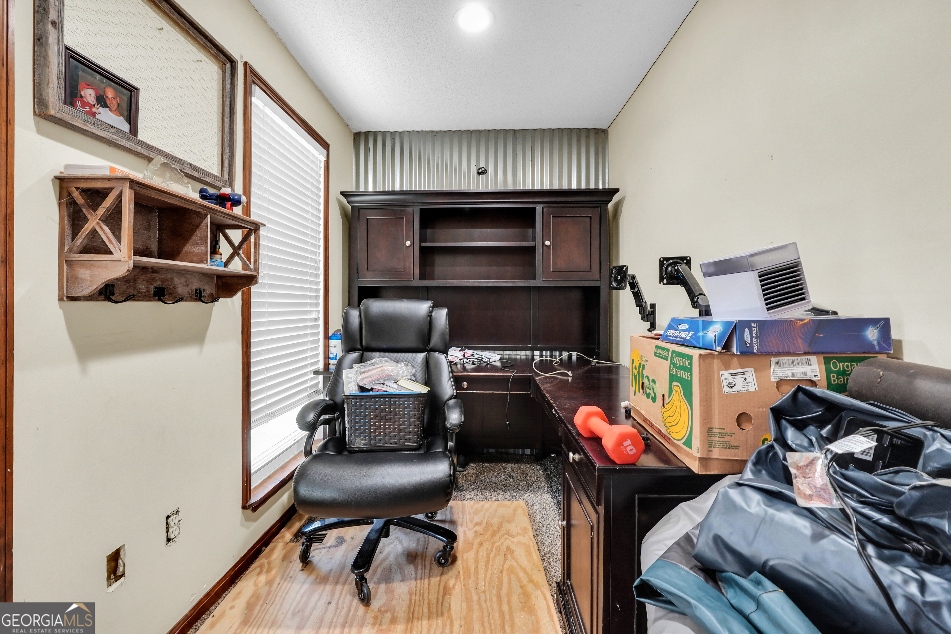 119 Bagley Road Forsyth, GA 31029 - Photo 16 of 36 a bedroom with furniture and a window