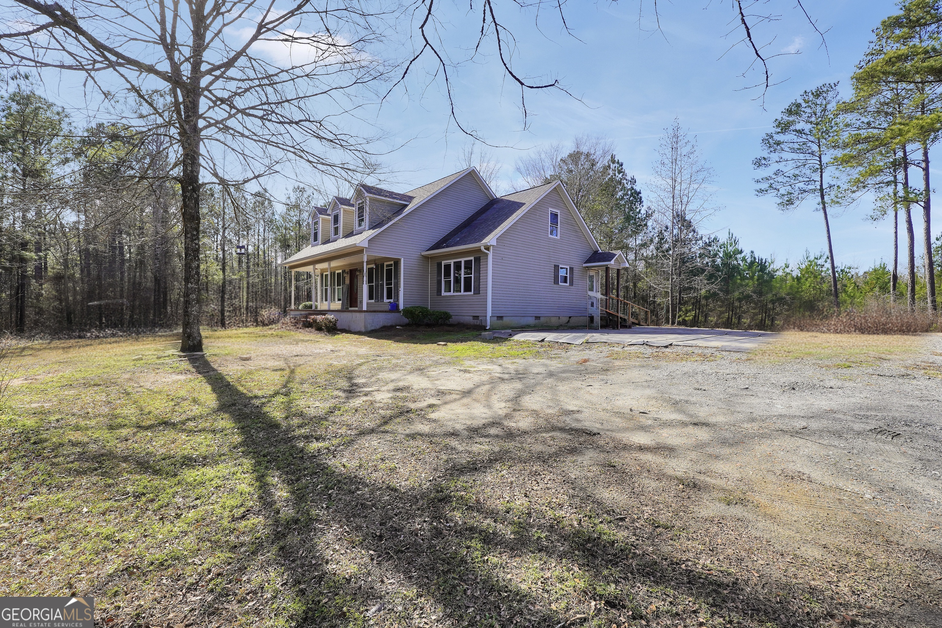 119 Bagley Road Forsyth, GA 31029 - Photo 3 of 36 a view of a house with a yard