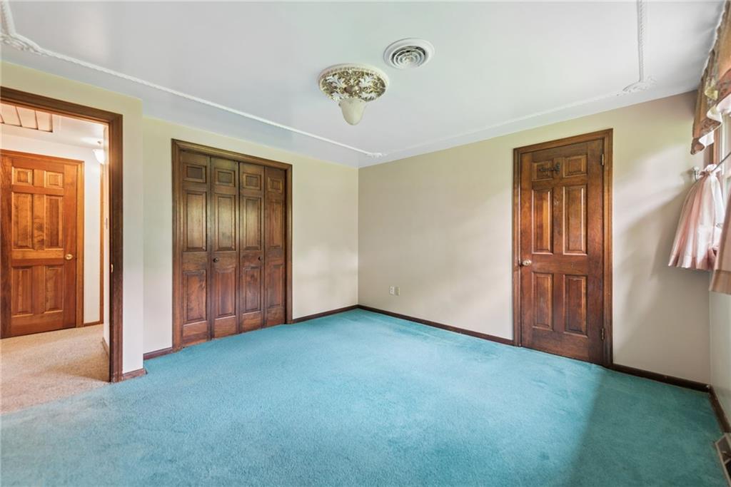 22 Buzzardtown Road Irwin, PA 15642 - Photo 25 of 44 an empty room with windows and closet