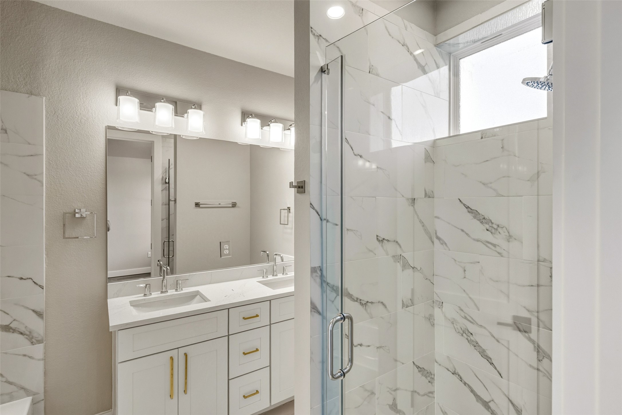 3424 Elser Street Houston, TX 77009 - Photo 15 of 36 a bathroom with a double vanity sink mirror and shower