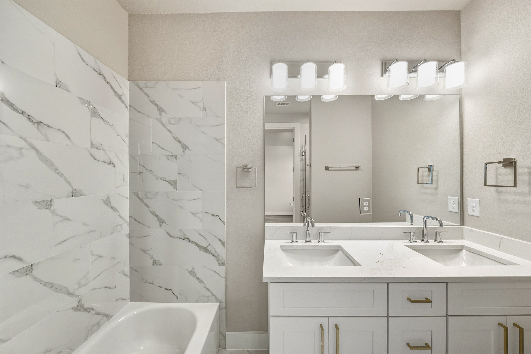 3424 Elser Street Houston, TX 77009 - Photo 16 of 36 a bathroom with a sink mirror and a bathtub