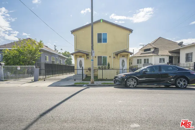 a car parked in front of a house