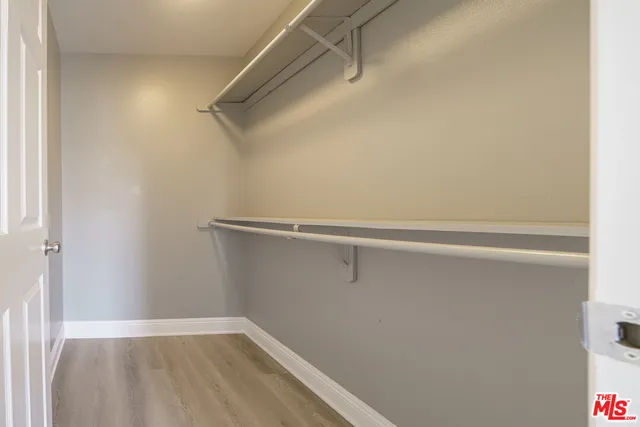 a view of a room with racks on the wall