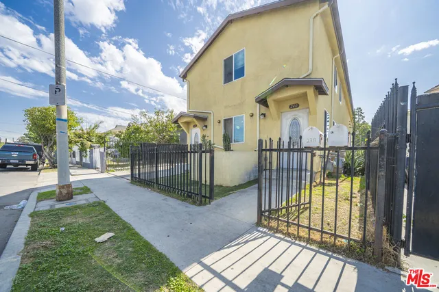 a view of a garden with a pathway