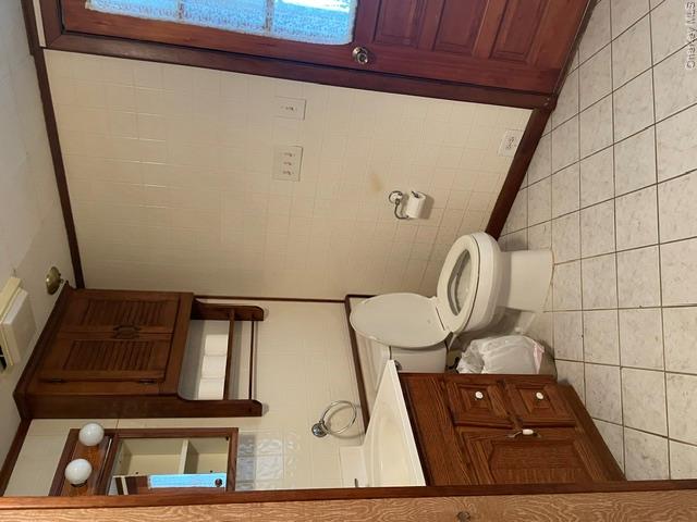 100 Decker Road, Unit 2 Wallkill, NY 12589 - Photo 20 of 23 a bathroom with a toilet a sink and shower
