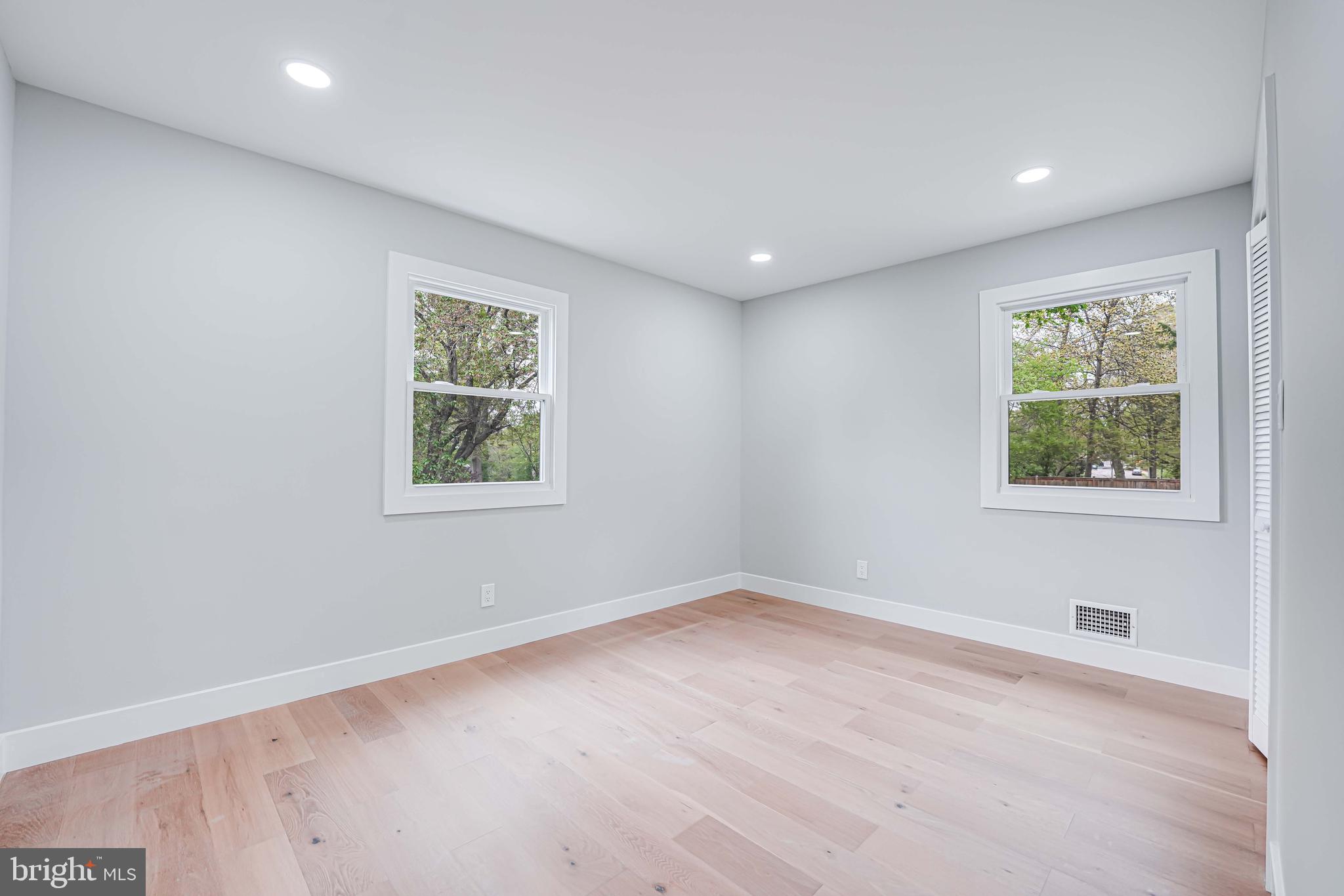 8643 Gateshead Road Alexandria, VA 22309 - Photo 21 of 40 an empty room with windows