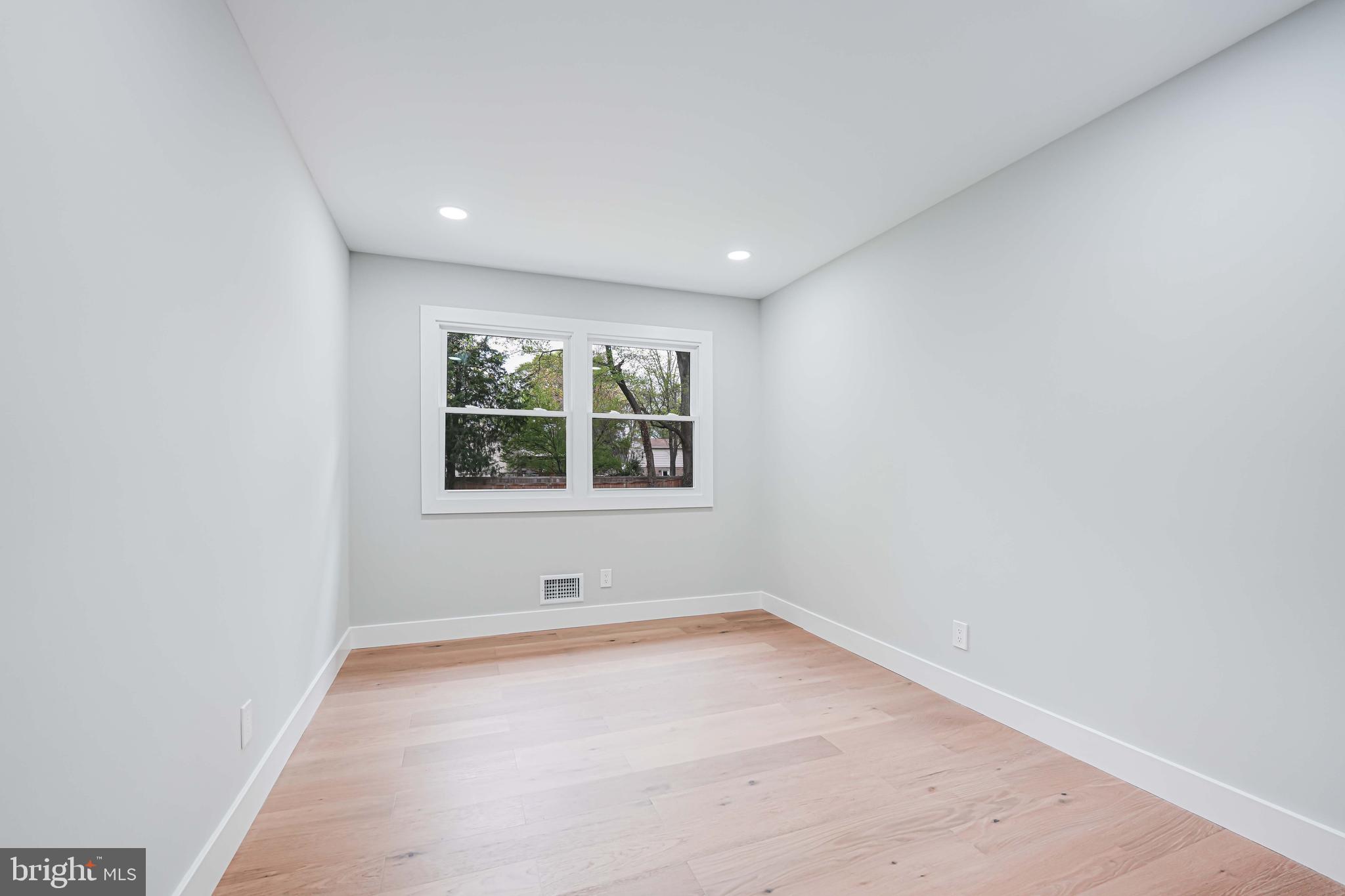 8643 Gateshead Road Alexandria, VA 22309 - Photo 24 of 40 an empty room with a window